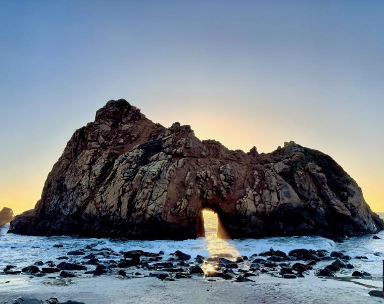 Pfeiffer Beach, CA, USA; large rock formation in the sea with sunset background - Pfeiffer Beach, CA, USA; large rock formation in the sea with sunset background Link to file
