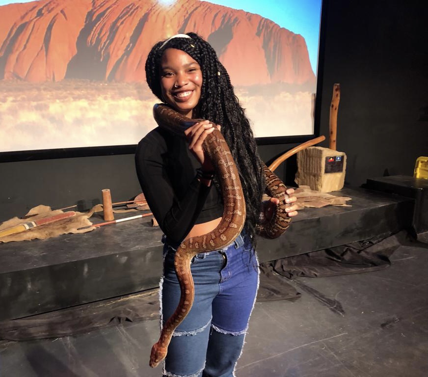 Alisha Burch holding a large snake