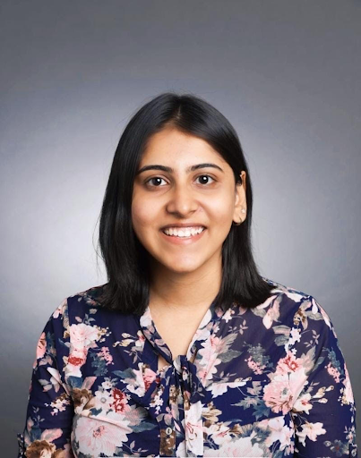 Professional headshot of Payal Mehta on gray background