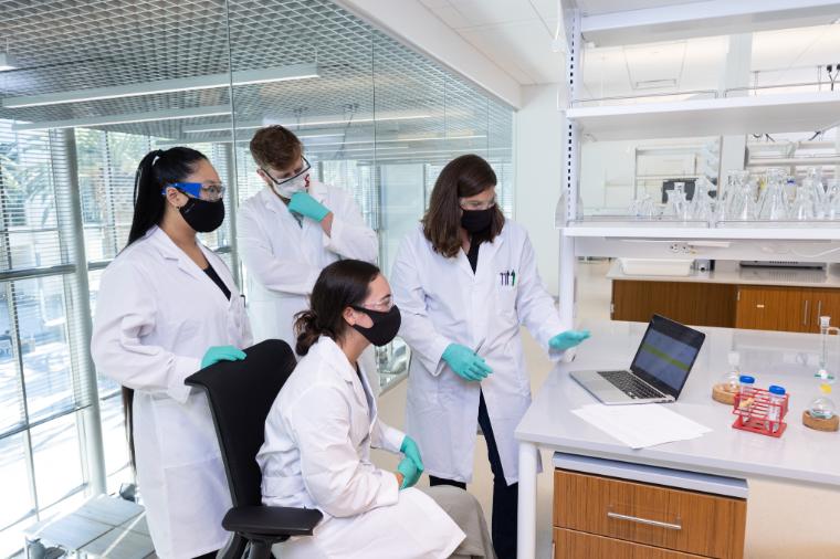 SCU faculty and students collaborate in a science lab