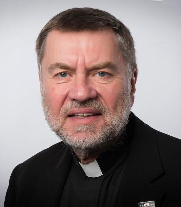A man in clerical attire.
