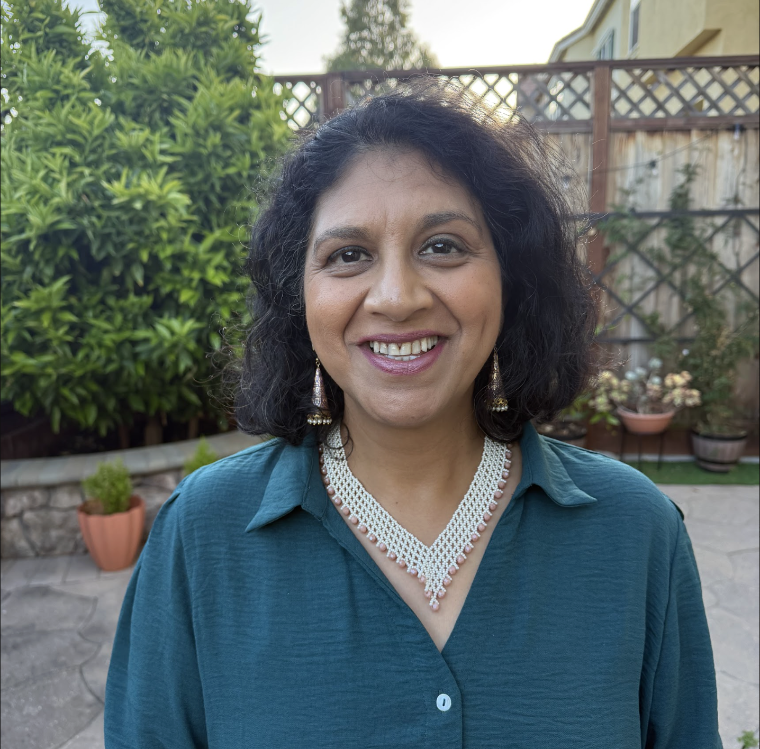 woman smiles at camera 
