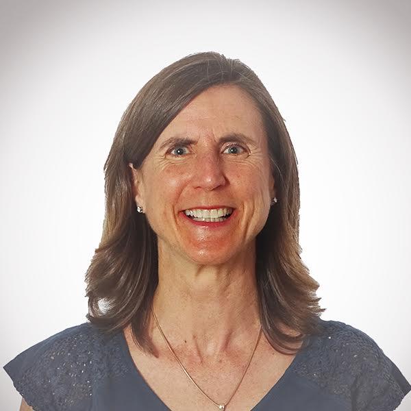 woman smiles at camera 