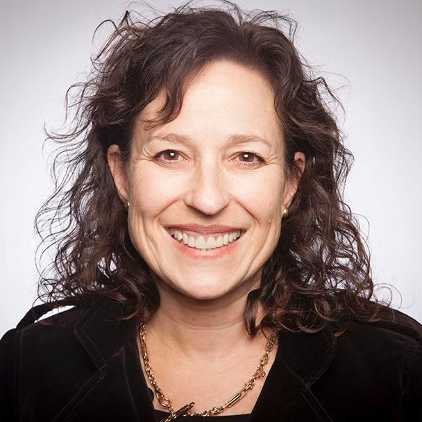 woman smiles directly at camera 