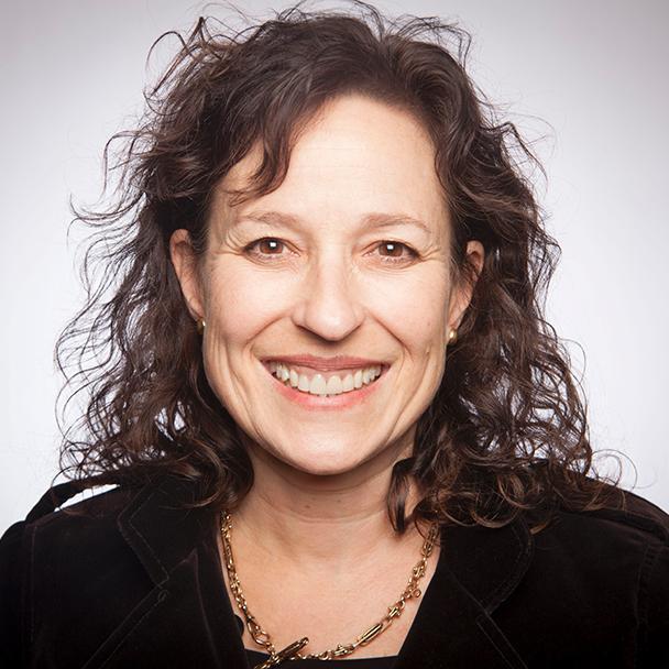 woman smiles directly at camera 