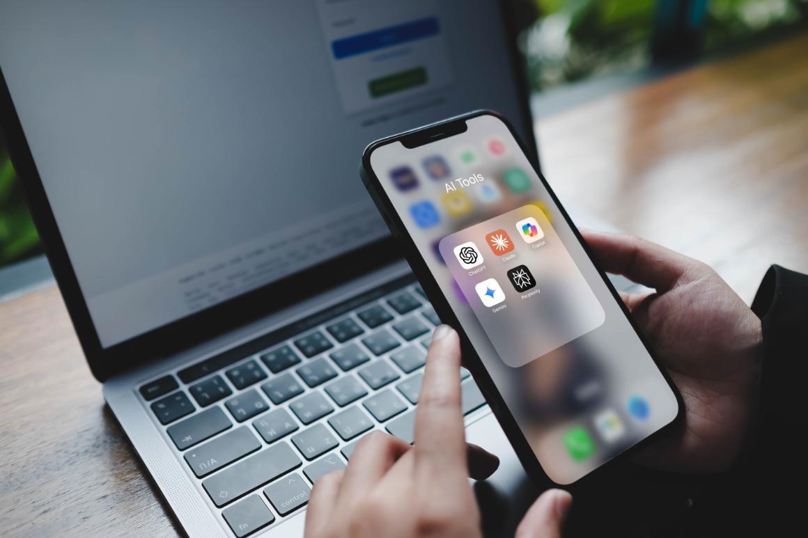 Stock image of phone with apps for AI tools