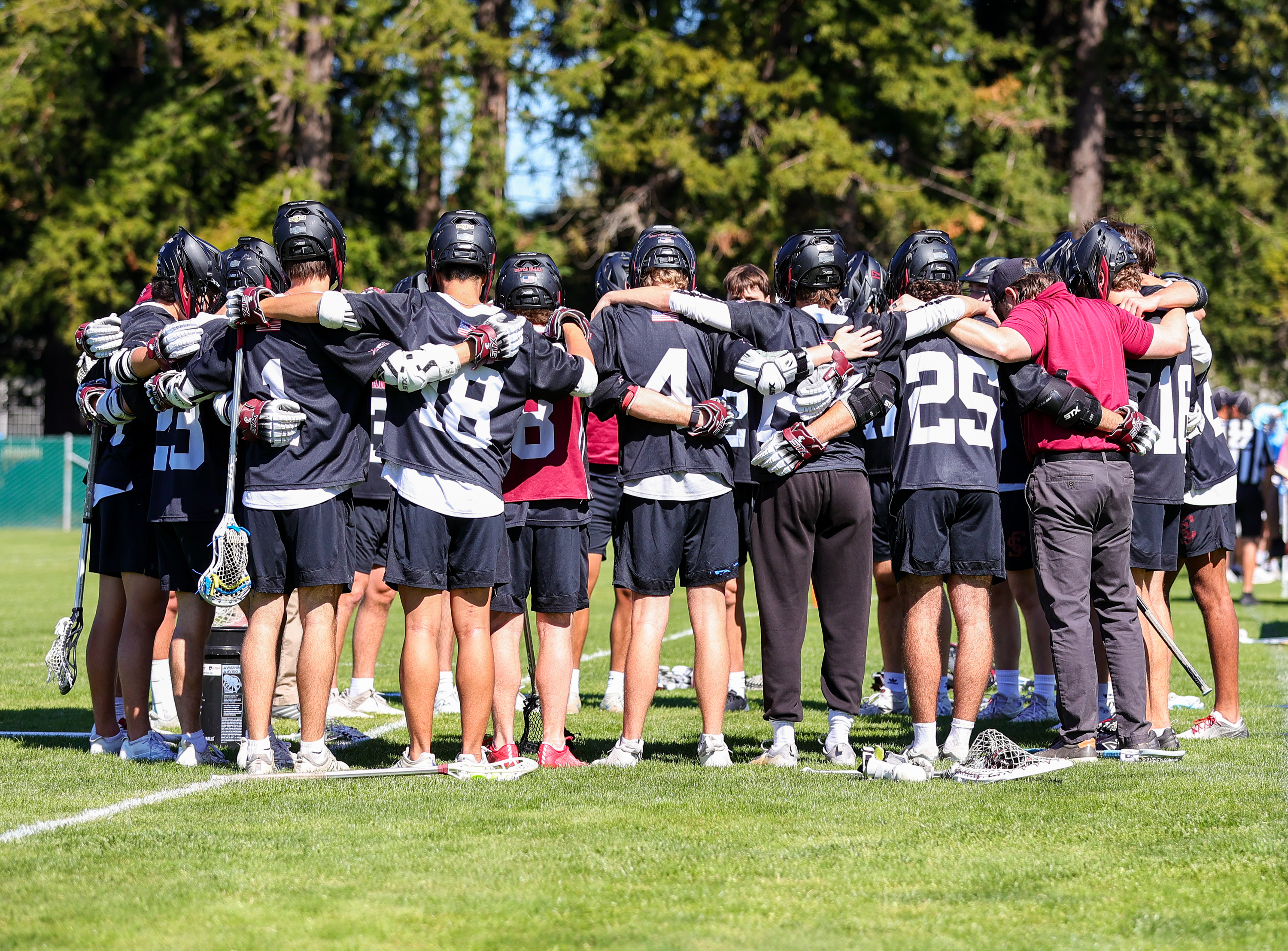2026 Lacrosse Team Huddle