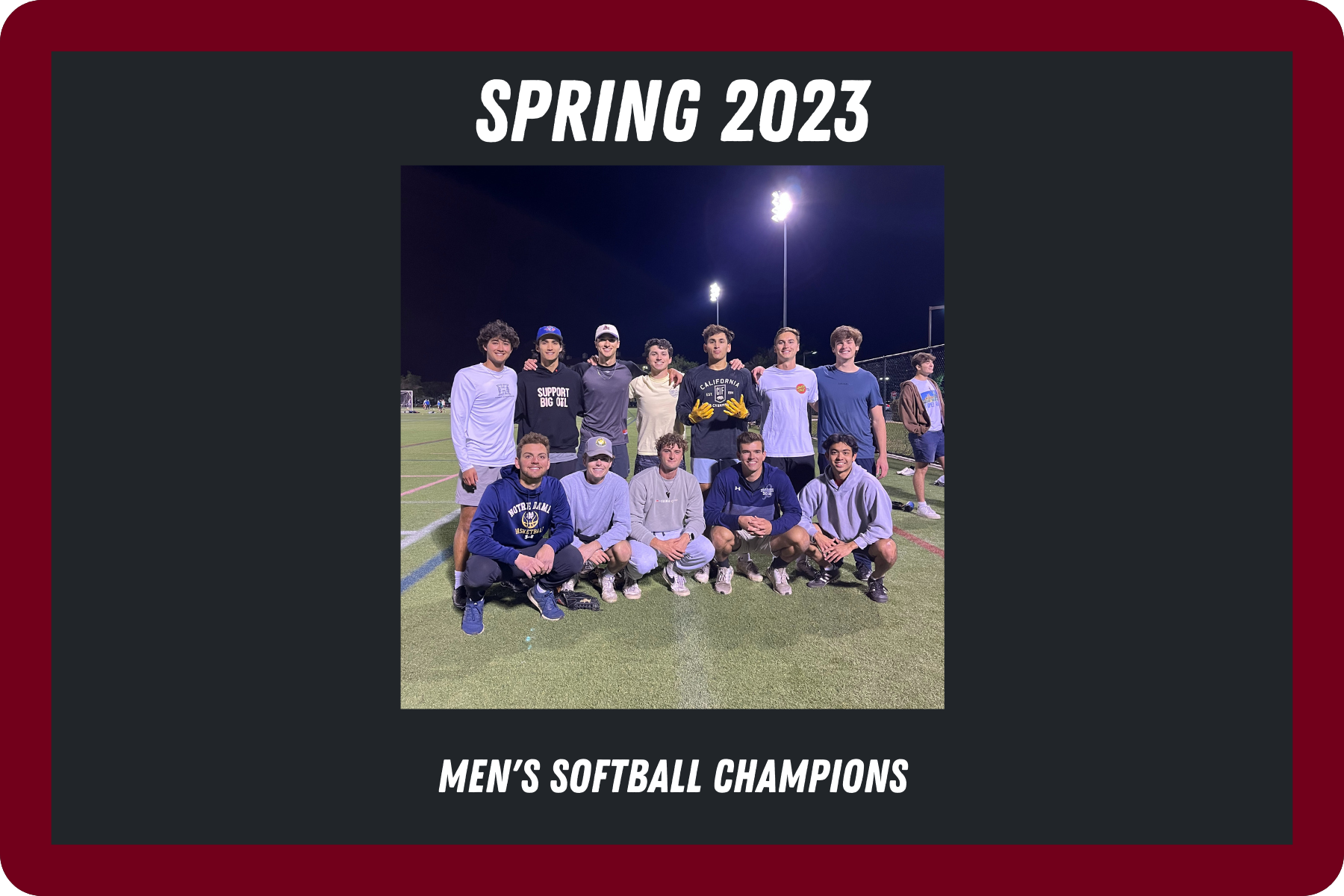 Image of spring 2023 mens softball champions posing on bellomy field after their win
