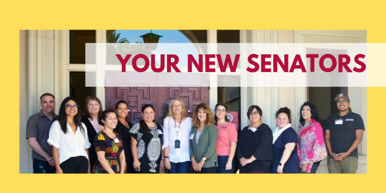 A group of people with a banner saying 