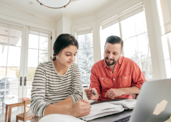 Parent and student doing homework together