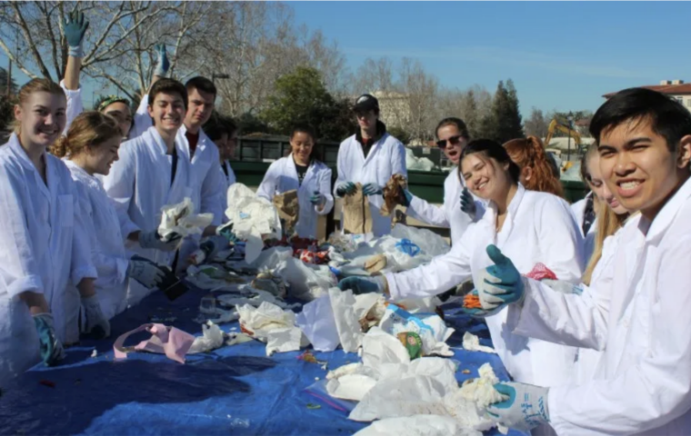 As part of an effort to become a zero-waste campus, a team of Santa Clara University sustainability students carry out a waste characterization study.