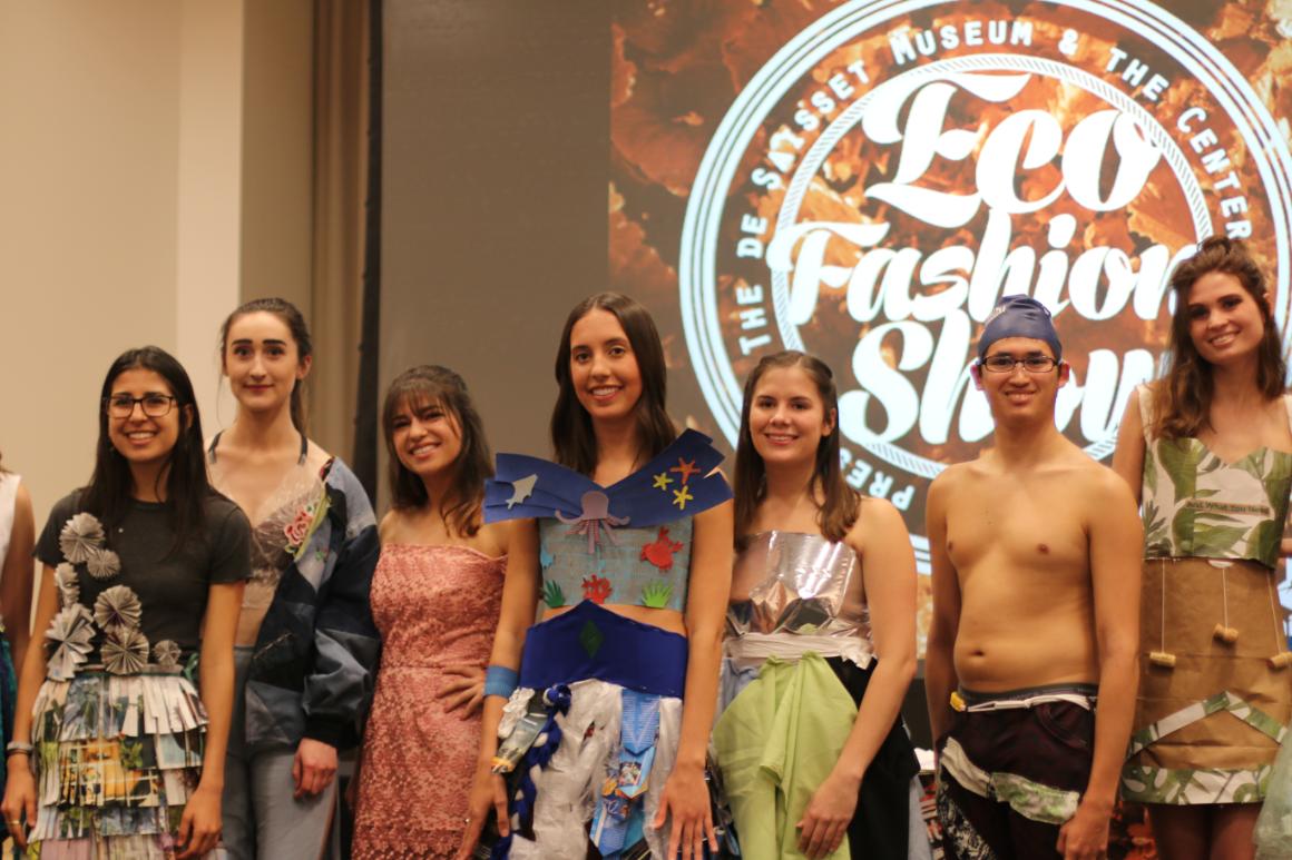 Eco-fashion show participants dressing in custom-made designs