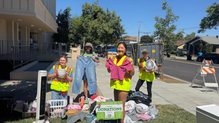 Student volunteers sorting items saved from the dumpster at Zero Waste Move Out 2026