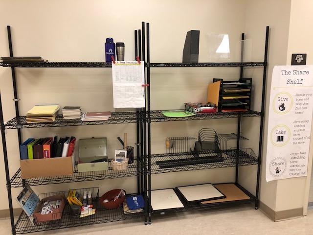 Various school and office supplies, such as binders, folders, and pens, are available for free at SCU's Share Shelf