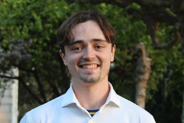 A photo of Declan smiling. 