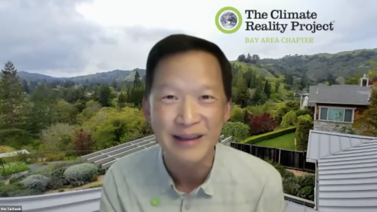 Wei-Tai Kwok of The Climate Reality Project Bay Area chapter speaks with a virtual background of mountains & trees