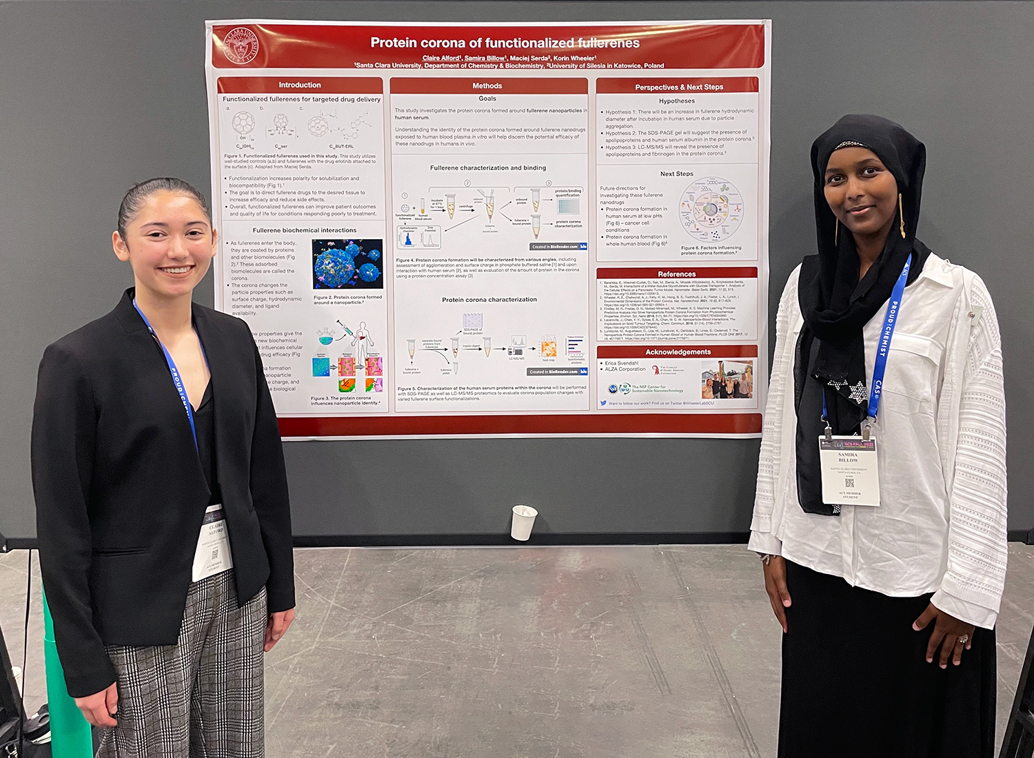 Claire Alford and Samira Billow stand with their poster at ACS Fall 2023