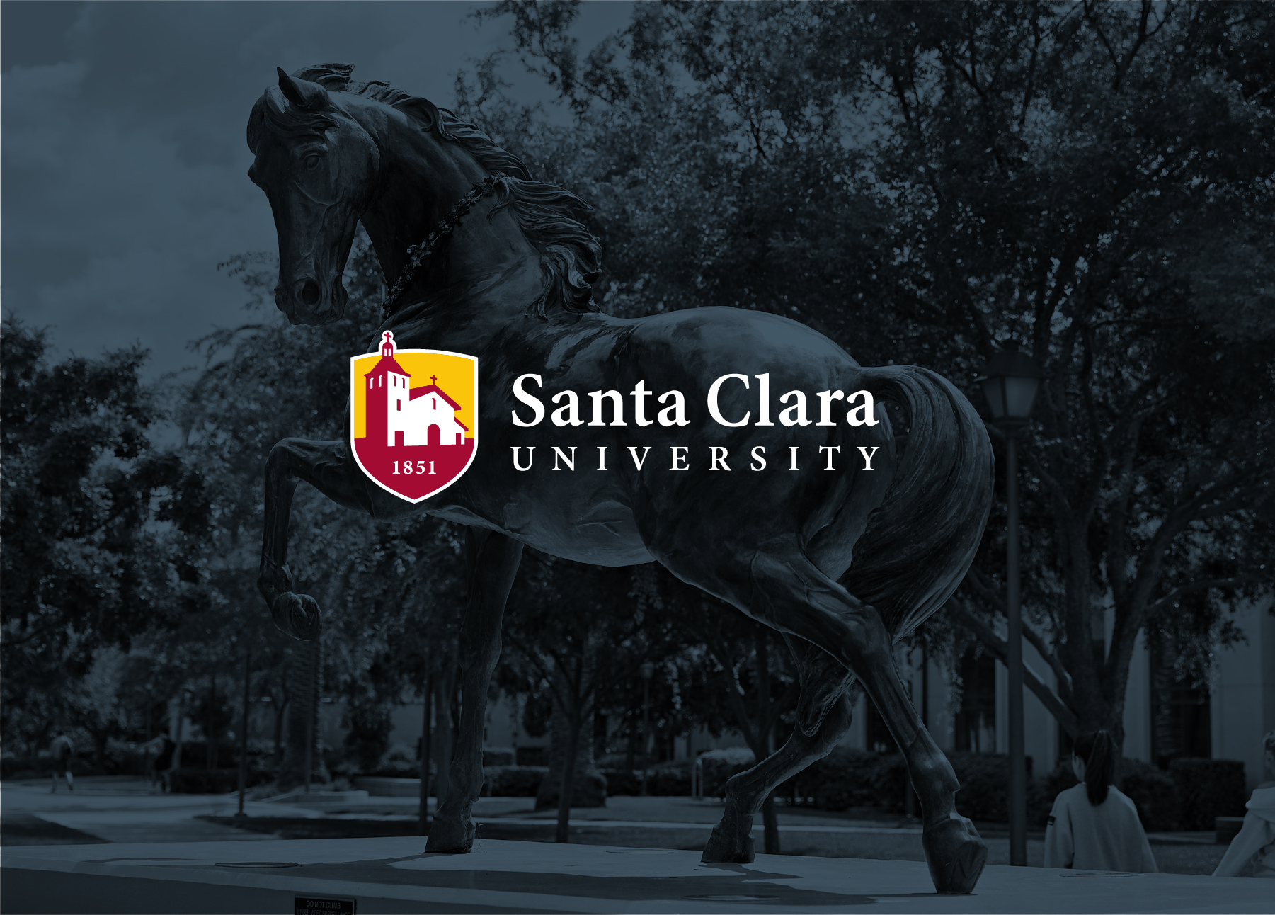 horizontal Santa Clara University logo on a dark slate-color background with blurred image of bronco statue