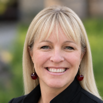 Heather Dumas-Dyer black jacket red top 