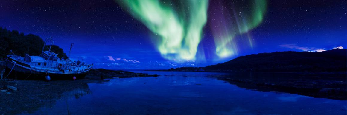 How Auroras Form: Electrons Surf Electromagnetic Waves Toward Earth