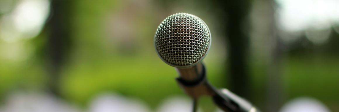 Microphone in the forefront with a blurred out background