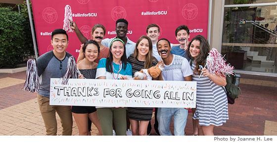 SCU students holding sign thanking donors for participation in 2016 Day of Giving.