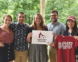 Five students who volunteered for the Jesuit Volunteer Corps.
