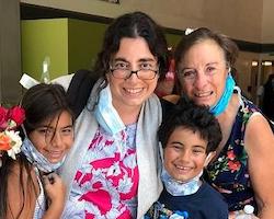 Dr. Maryann Dakkak '04 with her children and mother 