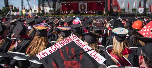 Photo of grad caps at 2016 Undergraduate Commencement.