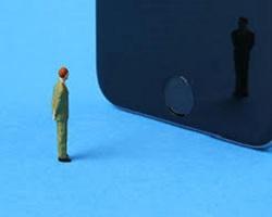 Illustration of a man standing before a giant iPhone.