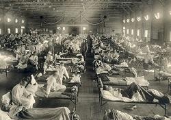 Black and white image of patients in an infirmary.