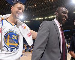 Lloyd Pierce with NBA player Steph Curry