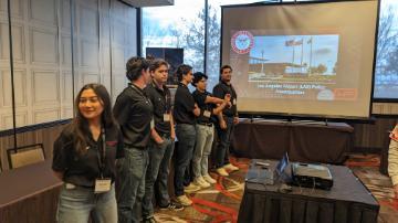 6 SCU civil engineering students in front of a projector screen presenting at the ASC Competition.