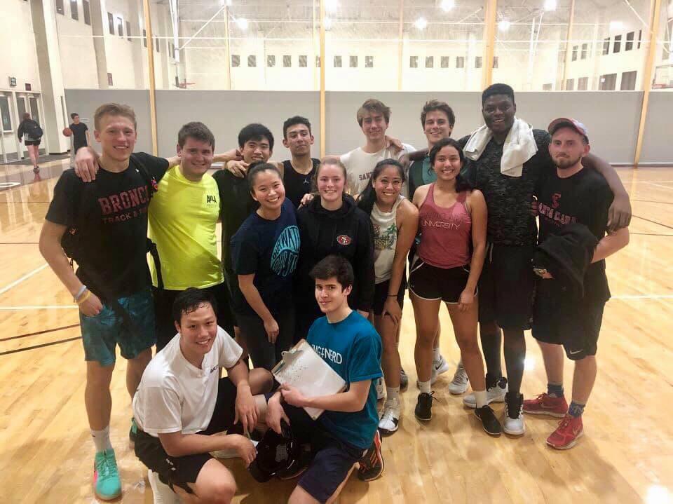 A group of people poses in a gym with Civil Intramural title.