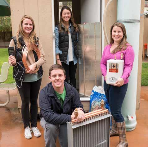 From left: Cora Lemar, Sam Heath, Mariko Tollan, and Ashley Husbands get ready to start experiments in their simulated greenhouse.