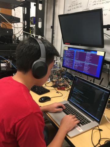 Simon Liu '20 at work in the SCU Internet of Things Laboratory