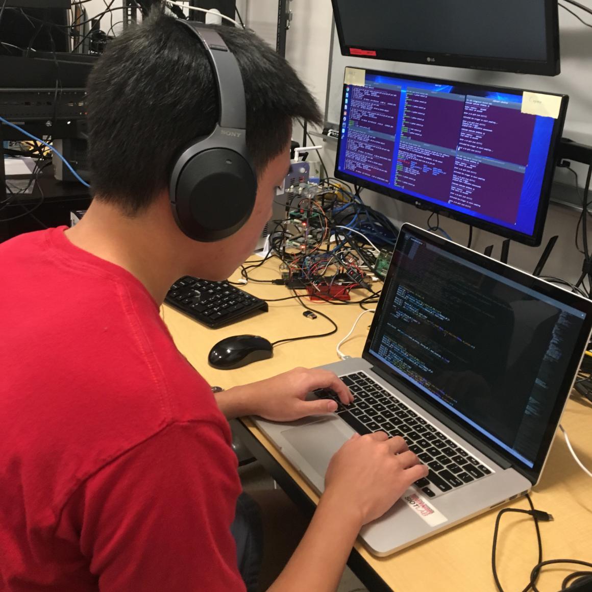 Simon Liu '20 at work in the SCU Internet of Things Laboratory image link to story