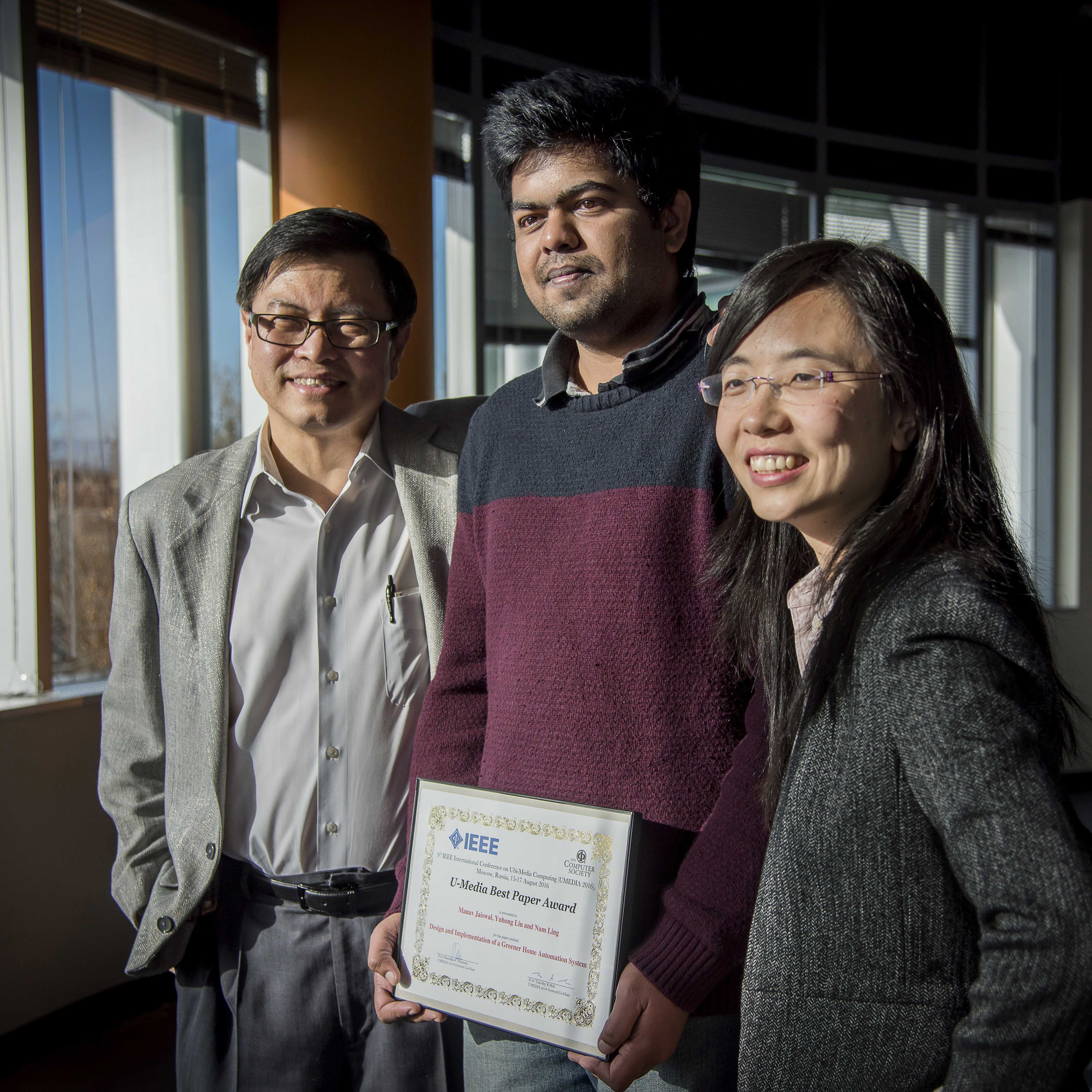 Nam Ling, Manav Jaiswal, and Yuhong Liu with their 