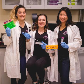 Marina Predovic, Eva Bouzos, and Ivy Fernandes in the Bioengineering Lab