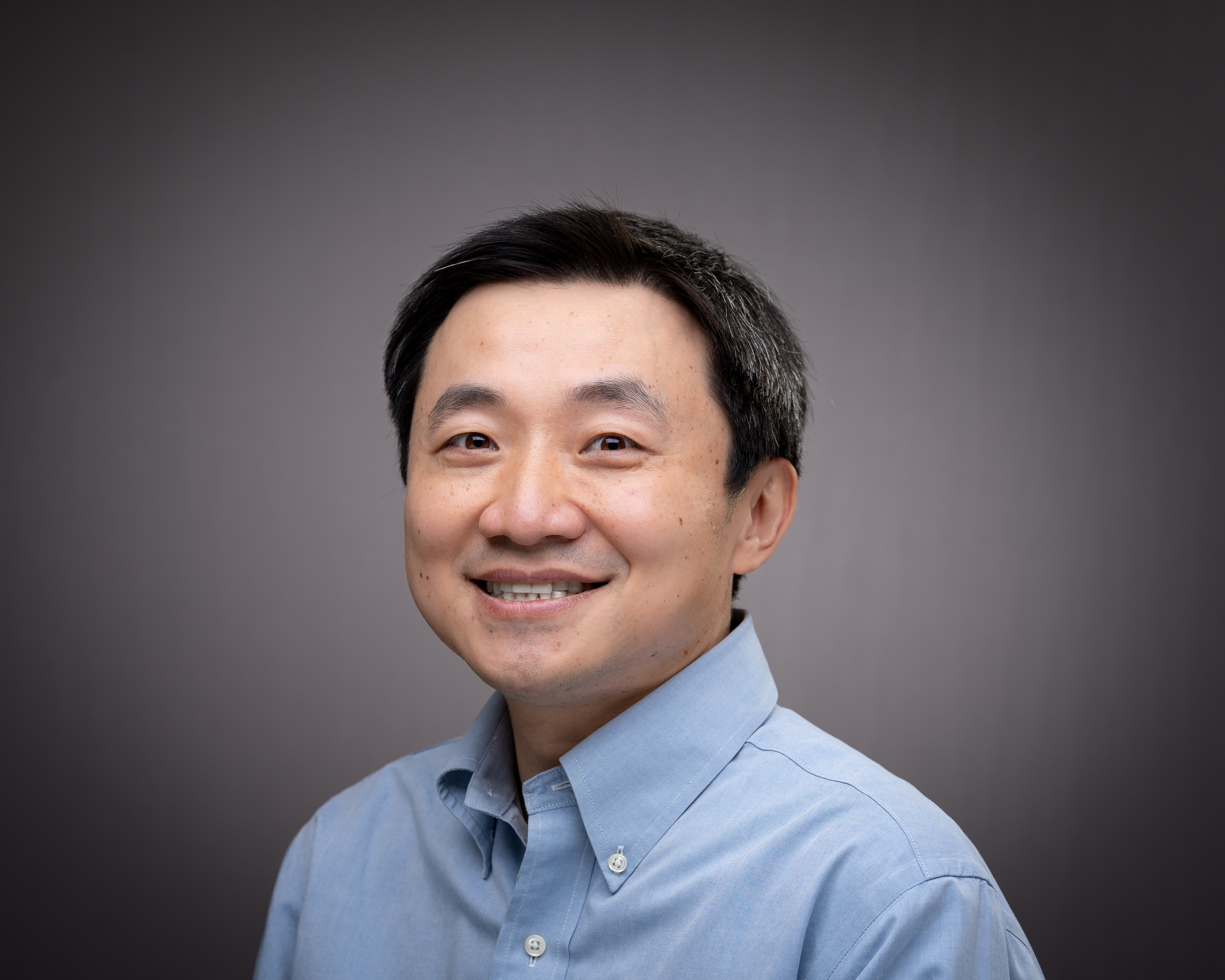 Headshot of Dr. Yi Fang
