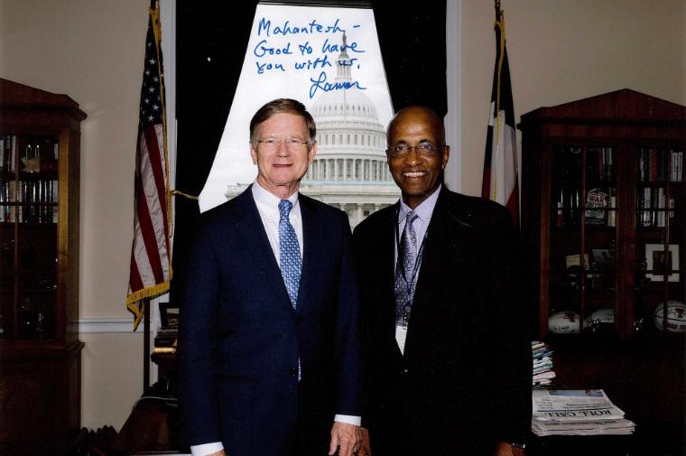 Hiremath, right, with Congressman Lamar Smith, chair of the Committee on Science, Space, and Technology