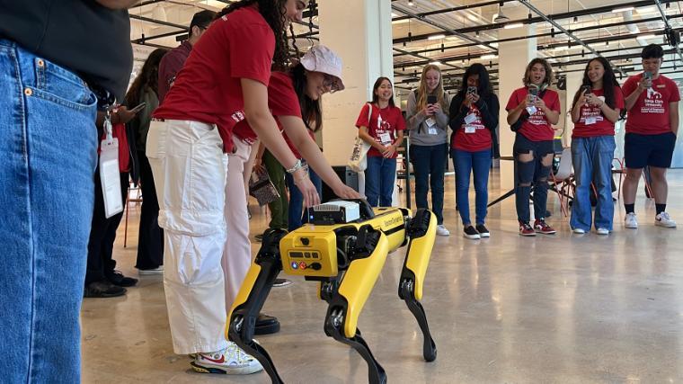 SES 2023 students received the chance to tour the Verizon Innovation Lab and witness a demo of the Boston Dynamics robot dog image link to story