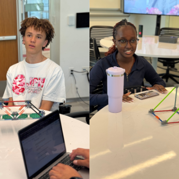 One make student in a white shirt with red graphic and 1 female student with blue sweater being interviewed while sitting at a table. image link to story