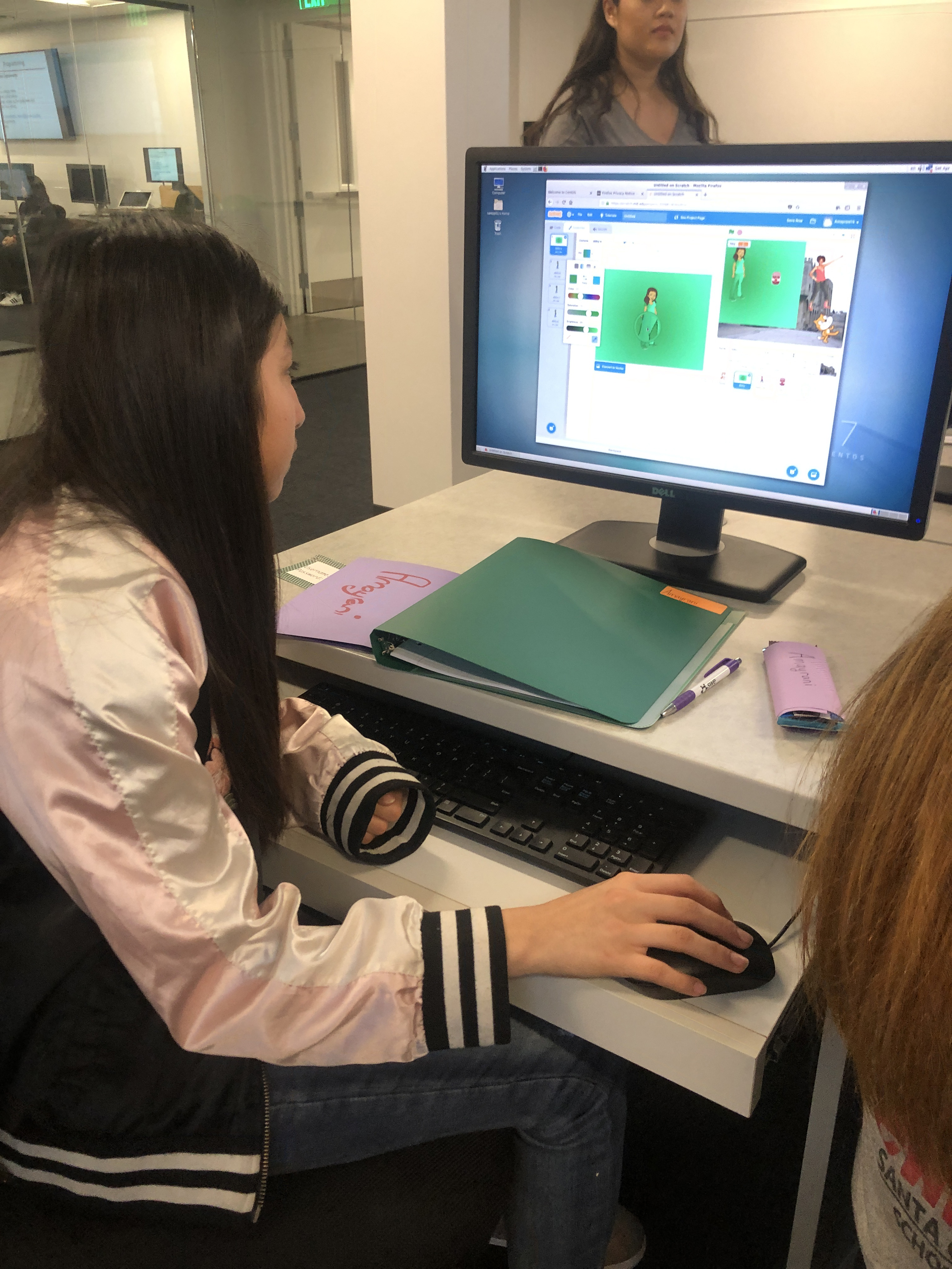 Young female student working on a coding project during SWE++