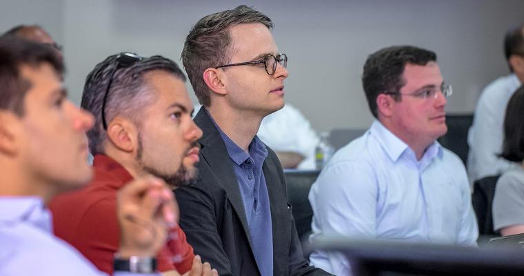 Executive students in a classroom setting. image link to story