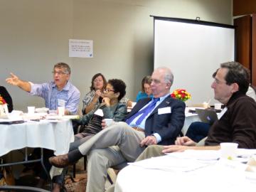 Members of the Executive Roundtable on Digital Journalism Ethics debate an issue. (Photo by Fabrice Florin under a Creative Commons License.)