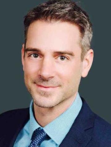 Headshot for newsmakers piece image link to story