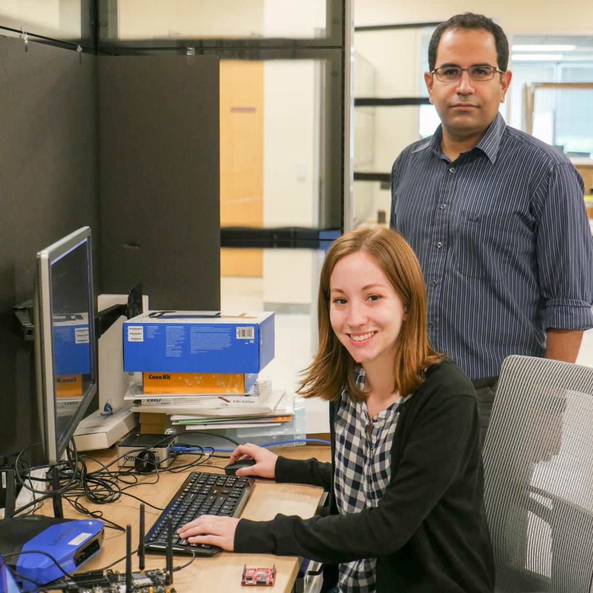 Assistant Professor Behnam Dezfouli and senior Angelina Poole image link to story