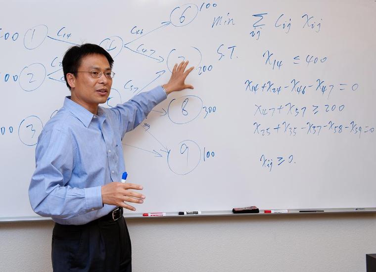 Gangshu (George) Cai teaching in the Leavey School of Business.