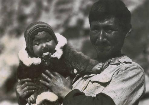 A King Island native father with his child. 